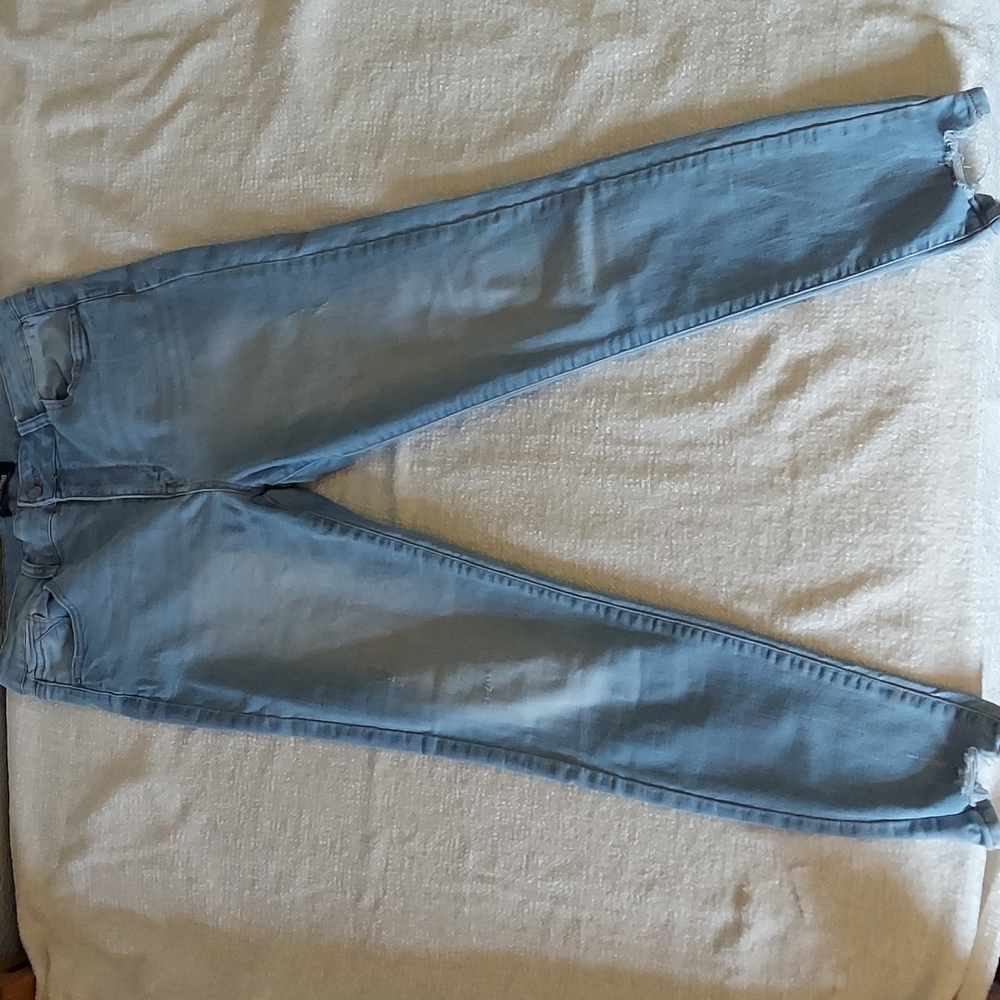 Light wash jeans by Wax Jean in a size 13/31.